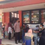 Penerima Bantuan Sosial di Abuki Disambut Tim Vaksin Covid - 19